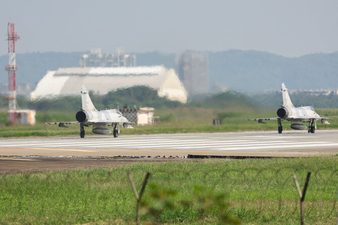 Taiwanese Air Force Mirage 2000 fighter jets are seen on the tarmac of an air force base in Hsinchu on October 14, 2024. (AFP)