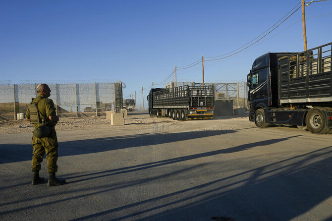 Israel says it is getting large quantities of humanitarian supplies into Gaza with land deliveries, including one on Monday morning, and airdrops. (AFP)