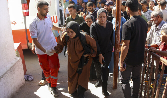 People who were injured during an Israeli operation in the Jabalia refugee camp in the central Gaza Strip arrive at Al-Ahli Arab hospital, also known as the Baptist hospital in Gaza City on October 21, 2024. (AFP)