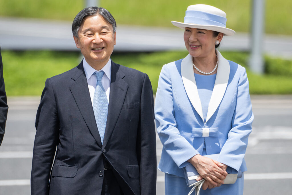 The Imperial couple listened closely to discussions by youths on themes such as climate change. (AFP)