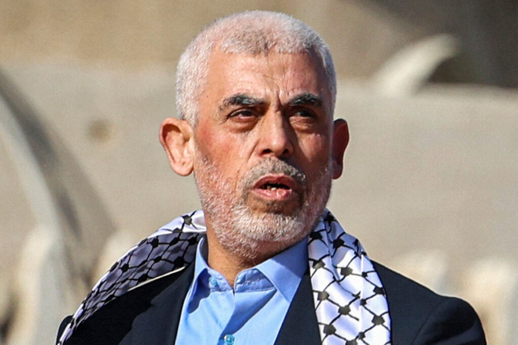 In this file picture dated December 14, 2022, the Gaza Strip chief of the Palestinian Islamist Hamas movement, Yahya Sinwar, appears before supporters during a rally marking the 35th anniversary of the group's foundation in Gaza City. (AFP)