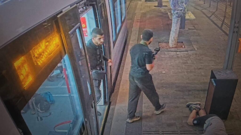 TV footage showed gunmen getting off at a light rail station and opening fire