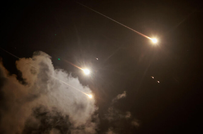 Projectiles are seen in the sky after Iran fired a salvo of ballistic missiles, amid cross-border hostilities between Hezbollah and Israel, as seen from Tel Aviv on Oct. 1, 2024. (Reuters)