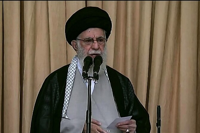 This image grab from a handout video provided by Iran Press on October 4, 2024, shows Iran's Supreme Leader Ayatollah Ali Khamenei delivering a rare Friday sermon at a mosque in Tehran after the Islamic republic had launched a missile attack on Israel. (AFP)