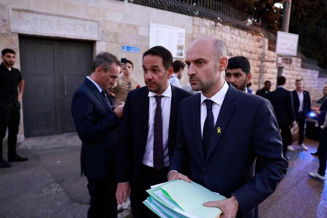 French Minister for Europe and Foreign Affairs Jean-Noel Barrot(R) walks away after cancelling his scheduled visit to the Eleona Domain in Jerusalem, on November 7, 2024. (AFP)