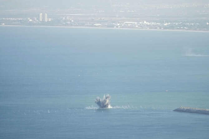 Rockets launched from Lebanon explode in the Mediterranean Sea as seen from Haifa, northern Israel on Nov. 8, 2024. (AP)