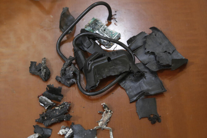 A photo taken on September 18, 2024, in Beirut’s southern suburbs shows the remains of exploded pagers on display at an undisclosed location. (File/AFP)