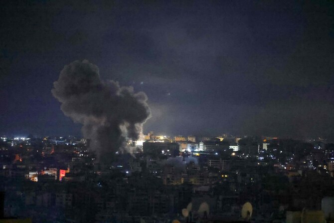 Smoke rises from the site of an Israeli airstrike targeting a neighborhood in southern Beirut on Nov. 13, 2024, amid the ongoing war between Israel and Hezbollah. (AFP)