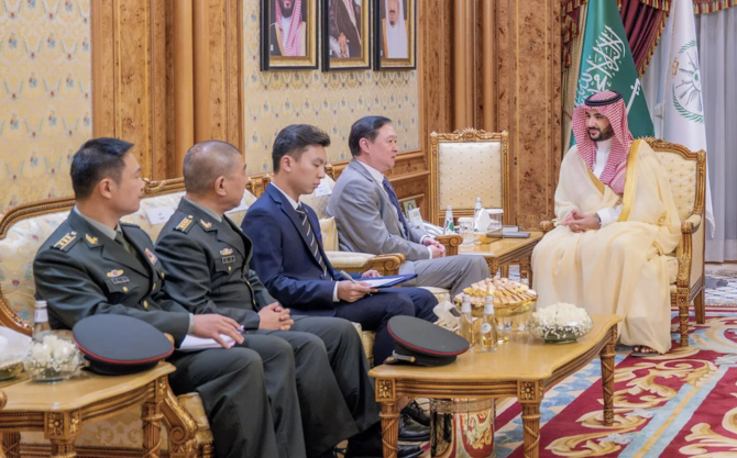 Saudi Minister of Defense Prince Khalid bin Salman Chinese ambassador to the Kingdom Chang Hua on Sunday. (SPA)