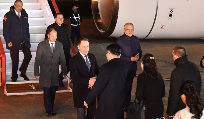 This picture taken on November 17, 2024 and released from North Korea's official Korean Central News Agency (KCNA) via KNS on November 18, 2024 shows Russia's Minister of Natural Resources and Ecology Alexander Kozlov (centre L) being welcomed upon his arrival at Pyongyang International Airport. (AFP)