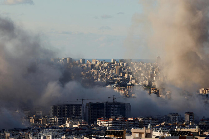 Smoke billows over Beirut's southern suburbs, after an Israeli strike, as seen from Baabda, Lebanon, November 26, 2024. (Reuters)