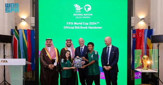 Saudi delegation led by Prince Abdulaziz bin Turki bin Faisal, minister of sport and president of the Saudi Olympic and Paralympic Committee, and Yasser Al-Misehal, Saudi Arabian Football Federation president, submitted the Kingdom's bid book to FIFA to host the FIFA World Cup 2034™ at a ceremony hosted in Paris, France, in July 2024. (SPA file photo)