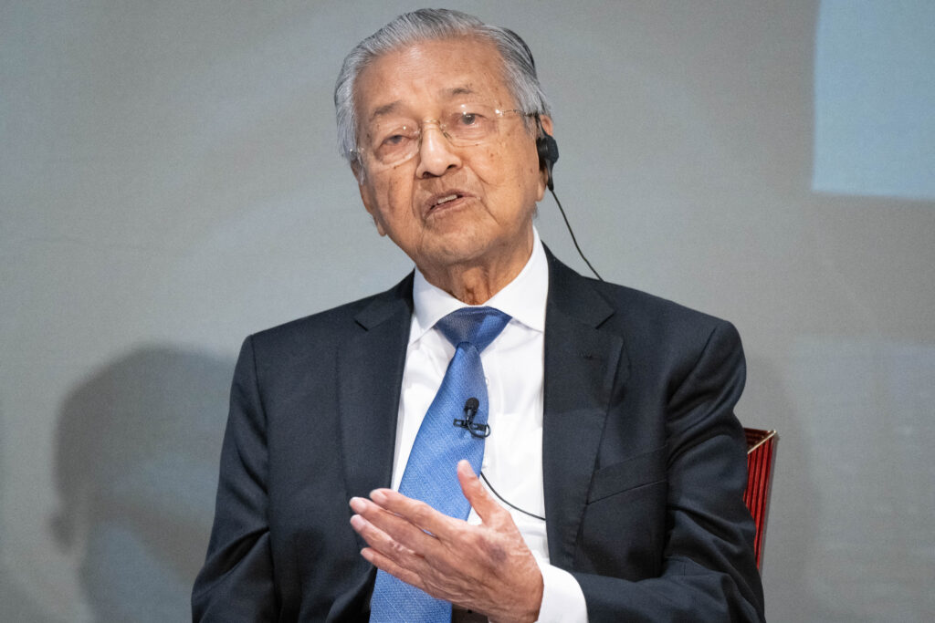 Mahathir also envisages a future where borders have less meant and immigration helps to fill in holes in the workforce. (AFP)