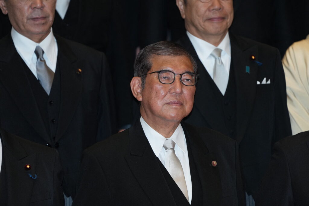 Japan's new Prime Minister ISHIBA Shigeru (C) poses during a photo session with members of his cabinet at the prime minister's official residence in Tokyo on November 11, 2024. (AFP)
