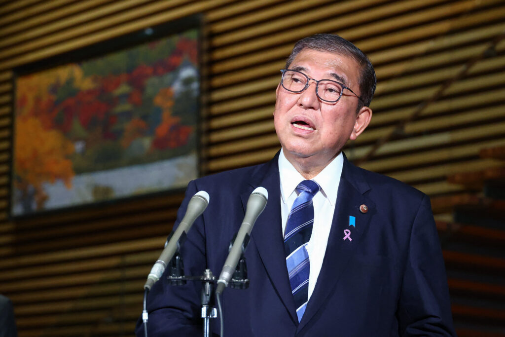 He gives priority to raising the country's average hourly minimum wages to 1,500 yen in the 2020s. (AFP)