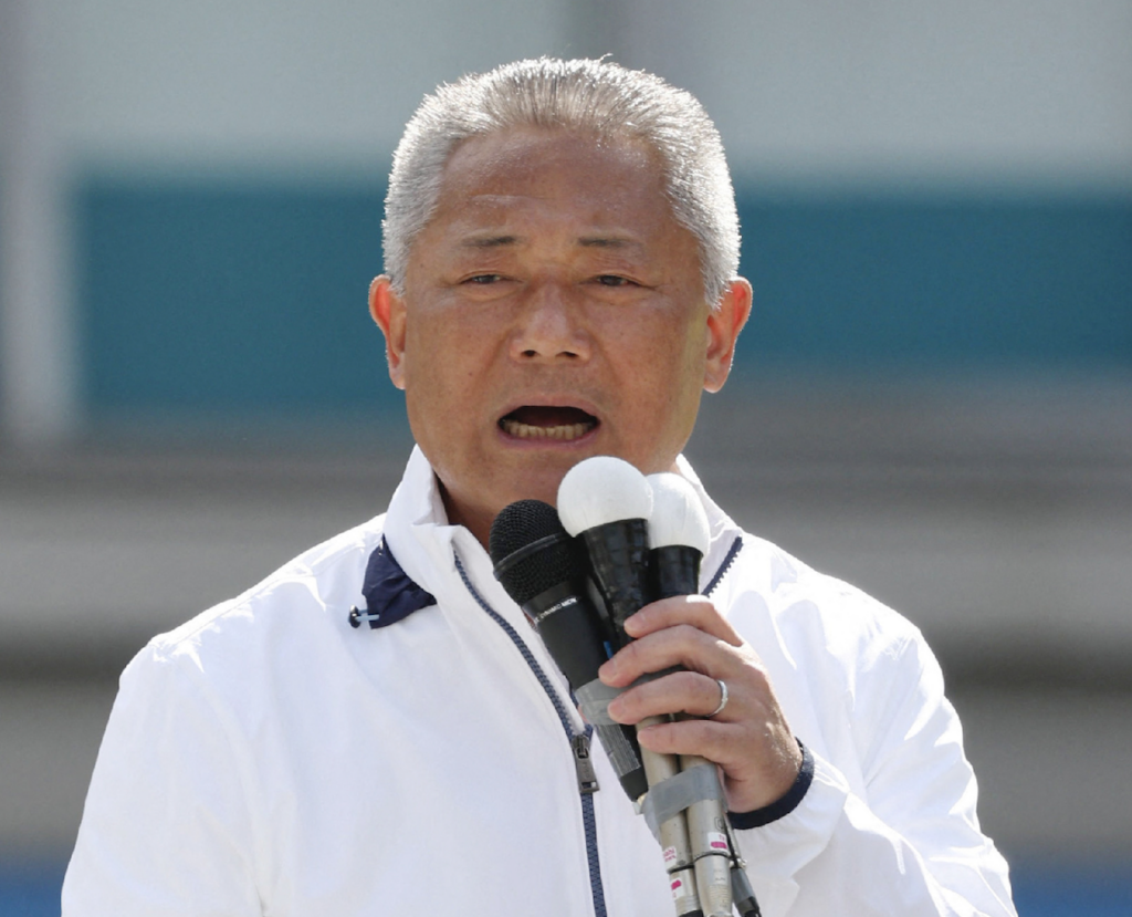Nobuyuki Baba, leader of the Japan Innovation Party Representative, delivers an election campaign speech in Tokyo on October 15, 2024. (AFP)