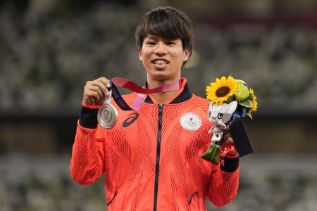 Silver medalist Koki Ikeda, of Japan, poses during the medal ceremony for the men's 20km race walk at the 2020 Summer Olympics, Aug. 6, 2021, in Tokyo. (AP/file)