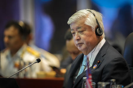 Japanese Defense Minister Gen Nakatani listens during the Association of Southeast Asian Nations (ASEAN) defense ministers' meeting in Vientiane, Laos, Thursday, Nov. 21, 2024. (AP Photo/Anupam Nath)