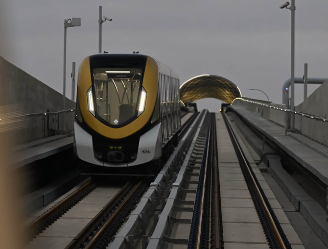 A large group of media professionals boarded a Metro departing from the KAFD station toward King Khalid International Airport as part of an introductory tour organized by the Royal Commission for Riyadh City for journalists on Friday. (AN Photo/Basheer Saleh)