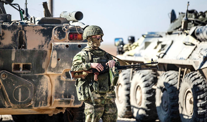 A Russian soldier stands guard in the northeastern Hasakeh province, Syria. (FileAFP)