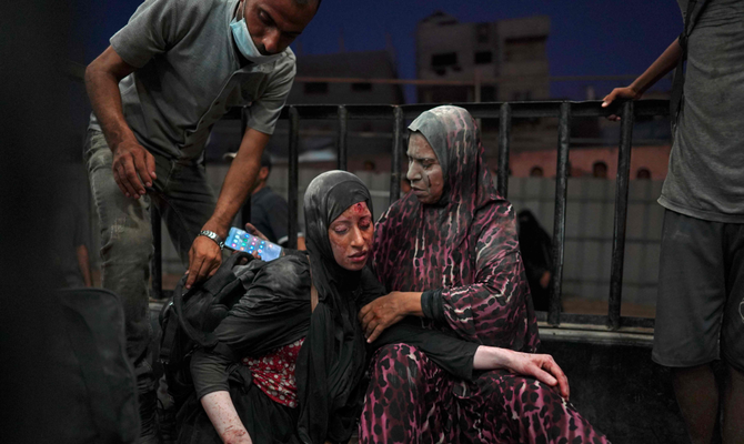 Women injured during Israeli bombardment arrive at the emergency ward at Al-Nassr hospital in Khan Yunis, on the southern Gaza Strip on July 23, 2024, amid the ongoing conflict between Israel and the Palestinian militant group Hamas. (AFP)