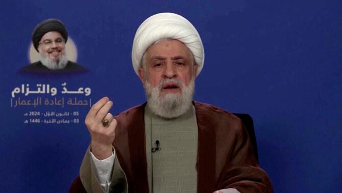 Lebanon’s Hezbollah leader Sheikh Naim Qassem delivers an address from an unknown location, in this still image from video released on Dec. 5, 2024. (Al Manar TV via Reuters)