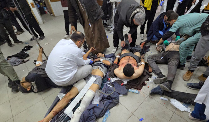 Victims are treated inside the Kamal Adwan hospital in Beit Lahia in the northern Gaza Strip, following Israeli strikes around the medical complex on December 6, 2024, as the war between Israel and the Palestinian Hamas militant group continues. (AFP)