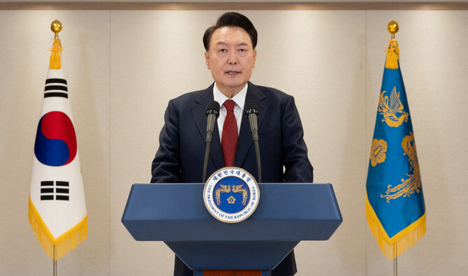 This handout photo taken on December 12, 2024 and released by the South Korean Presidential Office via Yonhap shows South Korean President Yoon Suk Yeol delivering an address at the Presidential Office in Seoul. (AFP)