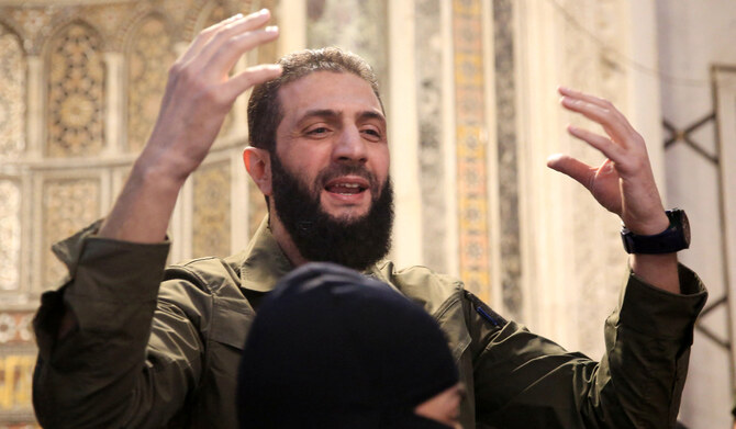 The leader of Syria's Islamist Hayat Tahrir al-Sham (HTS) group that headed a lightning rebel offensive snatching Damascus from government control, Abu Mohammed al-Golani, address a crowd at the capital's landmark Umayyad Mosque on December 8, 2024. (AFP)