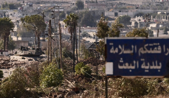 An Israeli army tank takes position in the Syrian town of Madinat al-Baath, in the UN-patrolled buffer zone in the Israeli-annexed Golan Heights on December 20, 2024. (AFP)