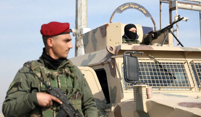 A member of Kurdish-led Syrian Democratic Forces (SDF) stands along a street, after rebels seized the capital and ousted Syria's Bashar al-Assad, in Hasakah, Syria, December 11, 2024. (REUTERS)
