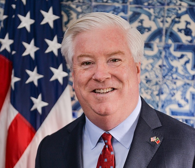 Glass, born in Oregon, has a background in investment banking and real estate business and is also versed in technologies. (Via US Dept. of State)