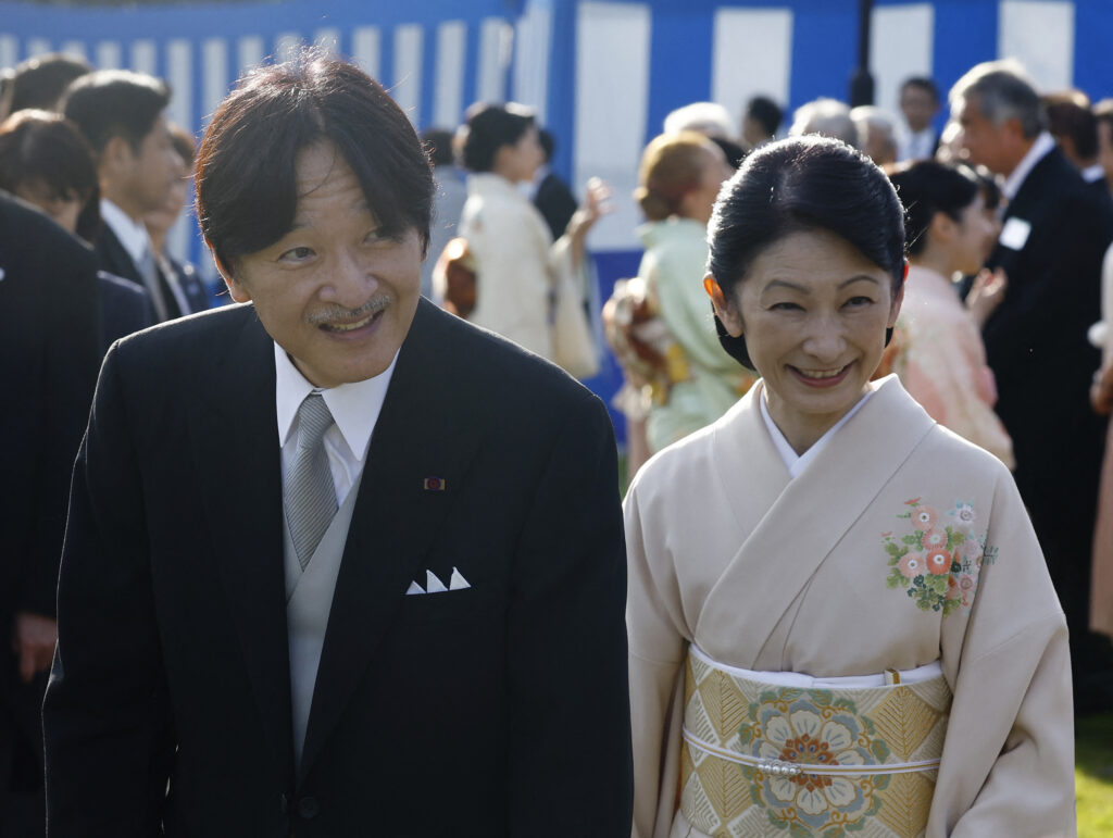 Japan's Crown Prince Akishino and Crown Princess Kiko attend the annual autumn garden party at the Akasaka Palace imperial garden in Tokyo on October 30, 2024. (AFP)
