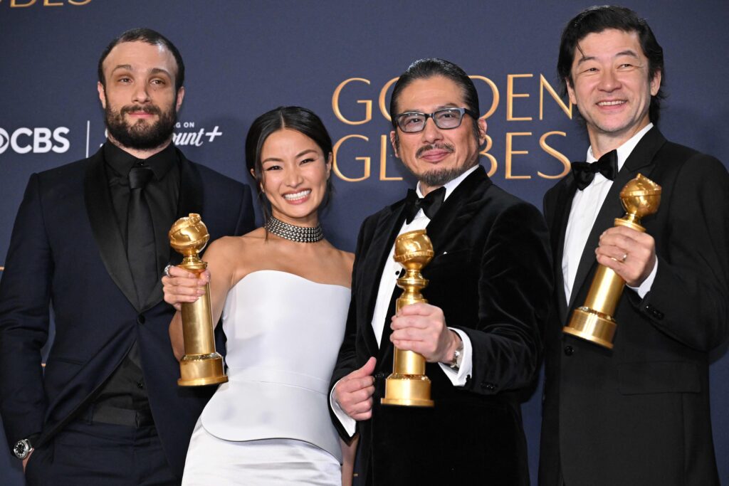 (From R) Japanese actor Tadanobu Asano, Japanese actor Hiroyuki Sanada and Japanese actress Anna Sawai pose in the press room with the award for Best Television Series - Drama 