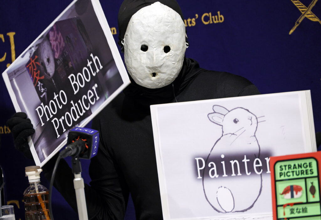 Japanese horror writer, novelist, and YouTuber named Uketsu attends during a press conference at the Foreign Correspondents' Club of Japan in Tokyo, Japan, 16 January 2025. (EPA)