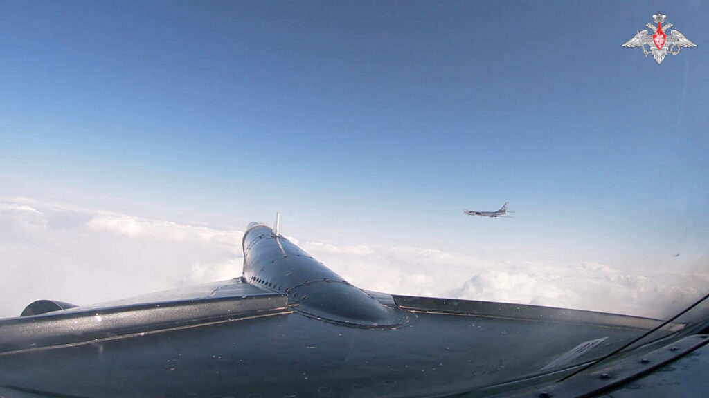 A Russian Tu-95 strategic bomber conducts flight over the neutral waters of the Sea of Okhotsk and Sea of Japan, in this still image from video released January 30, 2025. (Russian Defence Ministry/Handout via REUTERS)