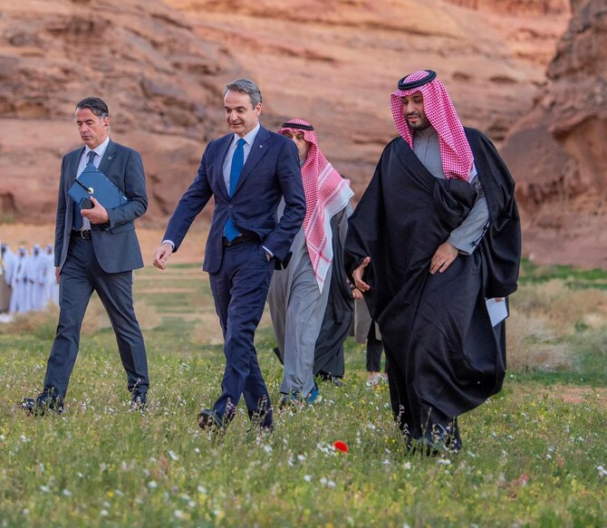 Saudi Arabia’s Crown Prince Mohammed bin Salman receives Greek PM Kyriakos Mitsotakis in AlUla on Monday. (SPA)
