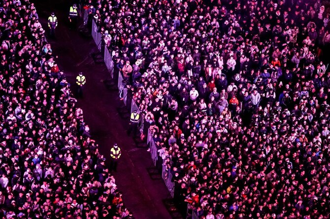 Revellers attend a 2025 New Year party in Taipei. (AFP)