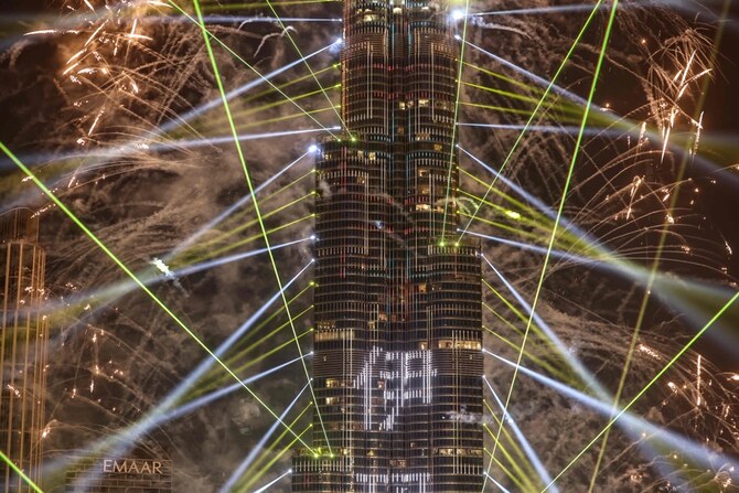 Fireworks explode around the Burj Khalifa Tower during New Year's celebrations in Dubai. (AFP)