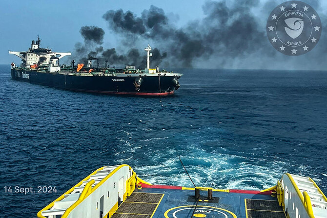 Above, the Greek-owned oil tanker Sounion being towed northward under military escort in a salvage operation on Sep. 14, 2024. (Eunavfor Aspides/AFP)