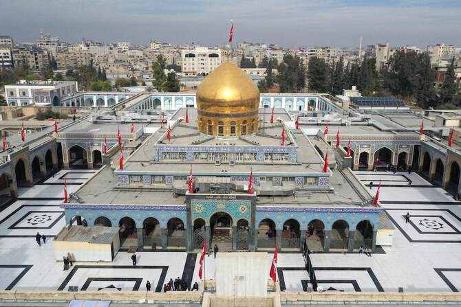 Above, an aerial view of Sayyida Zeinab, locally believed to hold the grave of Zeinab bint Ali, the daughter of Imam Ali and Fatima and granddaughter of the prophet Muhammad, in the southern suburbs of Damascus. (AFP file photo)