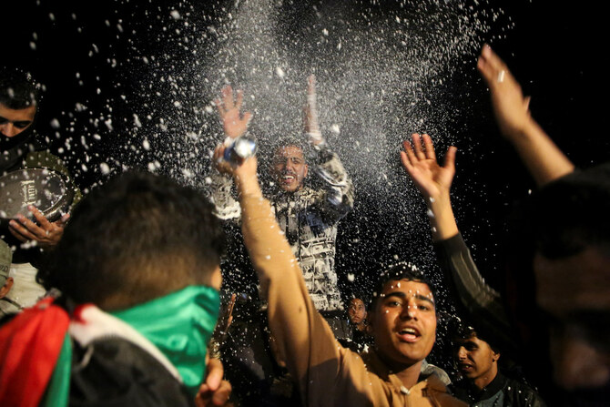 Palestinians react to news on a ceasefire deal with Israel, in Khan Younis in the southern Gaza Strip, January 15, 2025. (Reuters)