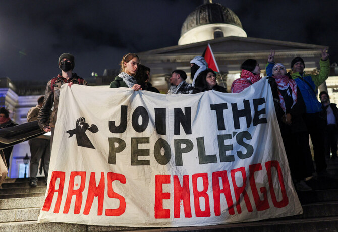 People hold a banner as members of Palestinian Youth Movement (PYM Britain) attend a rally in London on January 16, 2025, in solidarity with the Palestinians in Gaza and to mark the announcement of a ceasefire. (REUTERS)