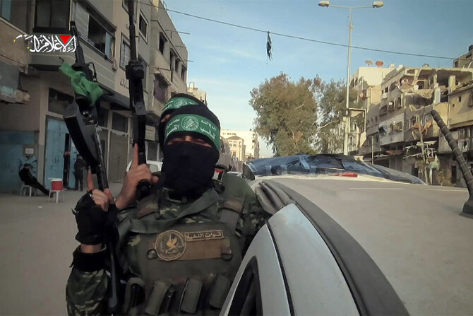A screengrab from handout video released by the Hamas Media Office shows fighters of the Ezzedine al-Qassam Brigades in the Gaza Strip, Jan. 19 (AFP)