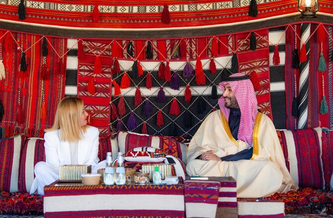 Saudi Arabia’s Crown Prince Mohammed bin Salman receives Italian Prime Minister Giorgia Meloni at the winter camp in AlUla on Sunday. (SPA)