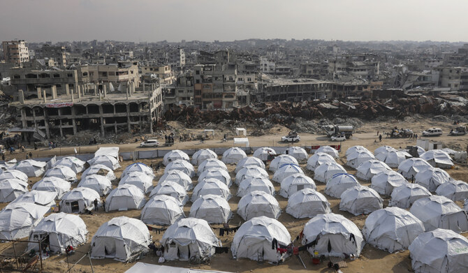 A tent camp for displaced Palestinians is set up amid destroyed buildings in Shijaiyah neighbourhood, Gaza City, Tuesday, Jan. 28, 2025. (AP)
