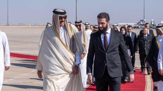 The Emir of Qatar, Sheikh Tamim bin Hamad Al-Thani and Ahmed Al-Sharaa, the interim president of Syria. (QNA)