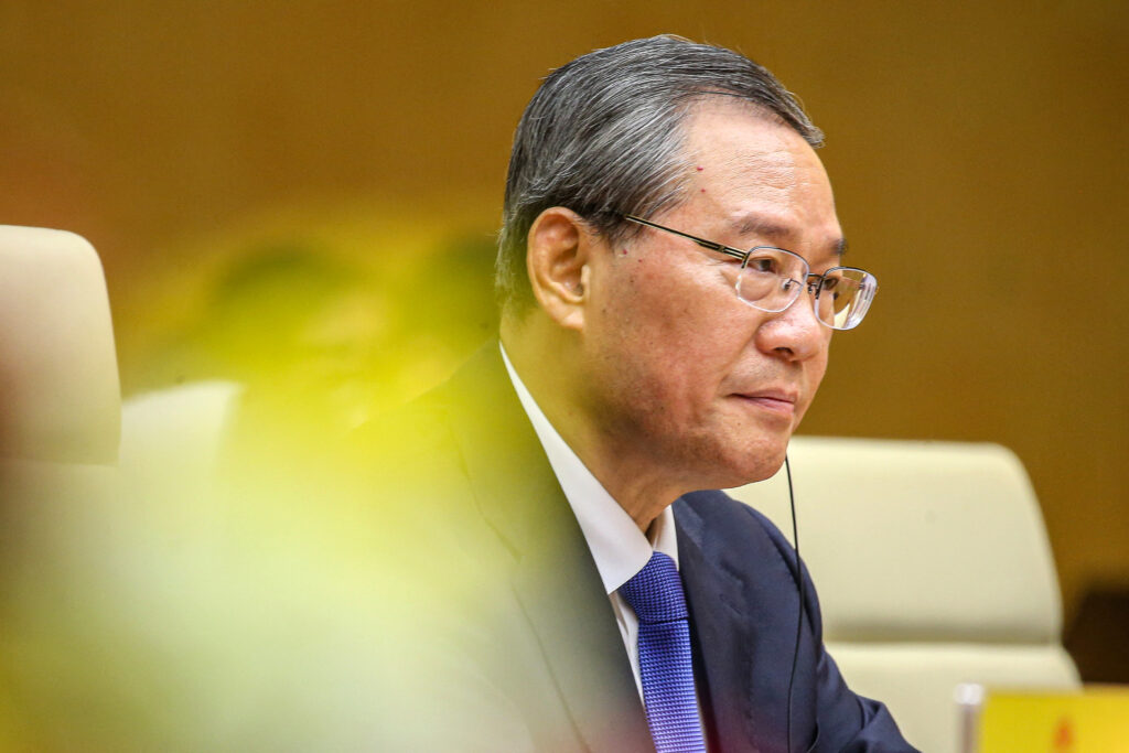 China's Premier Li Qiang looks on during a meeting with Vietnam's Prime Minister Pham Minh Chinh (not pictured) at the Government Office in Hanoi on October 13, 2024. (AFP)