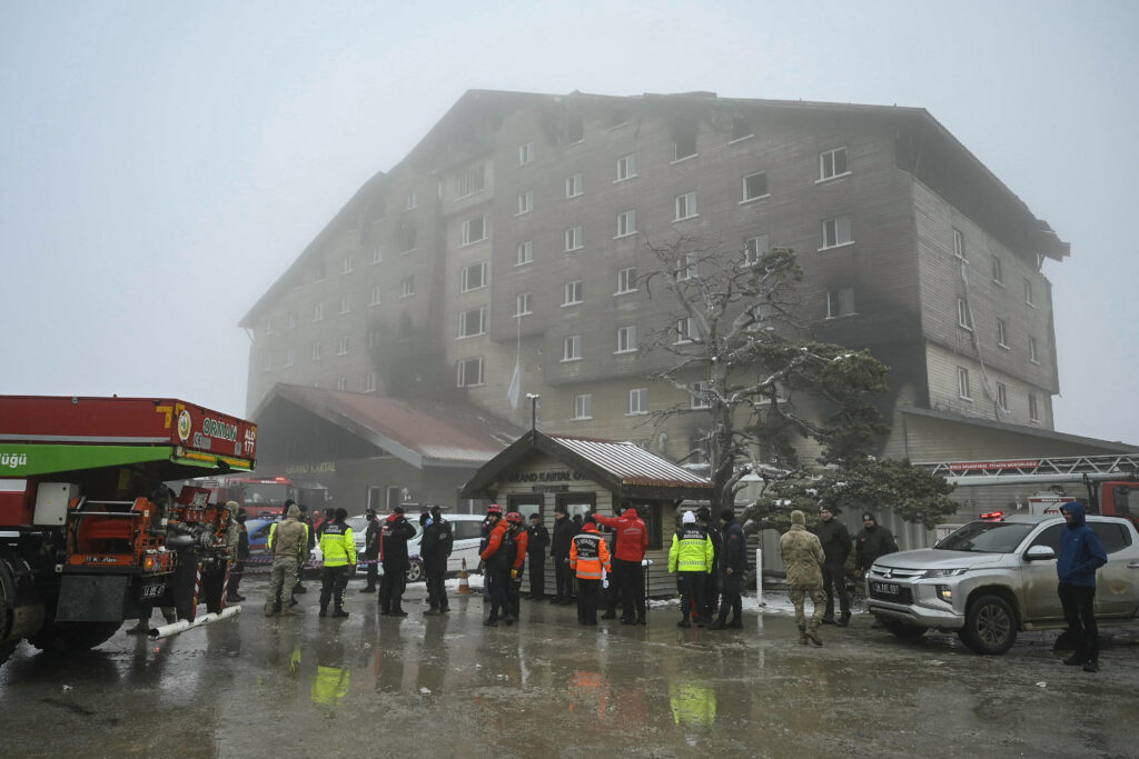 Turkish emergency personnel operate on the aftermath of a fire that broke out at the Grand Kartal Hotel in the Kartalkaya Ski Resort in Bolu, on January 22, 2025. (AFP)