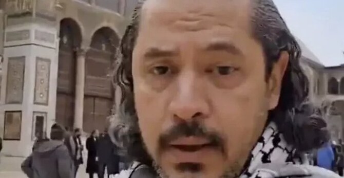 The image is a screengrab from a video Qaradawi posted from his visit to Syria. (Screengrab)
